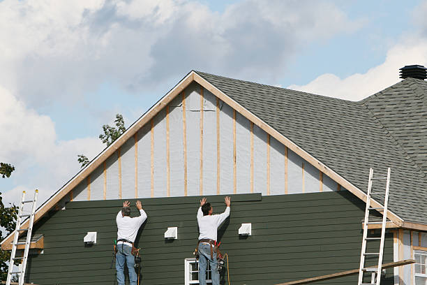 Professional Siding Replacement technician working in Belmont, MA